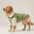 Bespoke pet outerwear with a solid green body and textured lambswool sleeves.